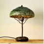 Metal table lamp with a stone stand