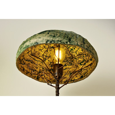 Metal table lamp with a stone stand
