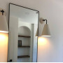 White and black ceramic wall sconce